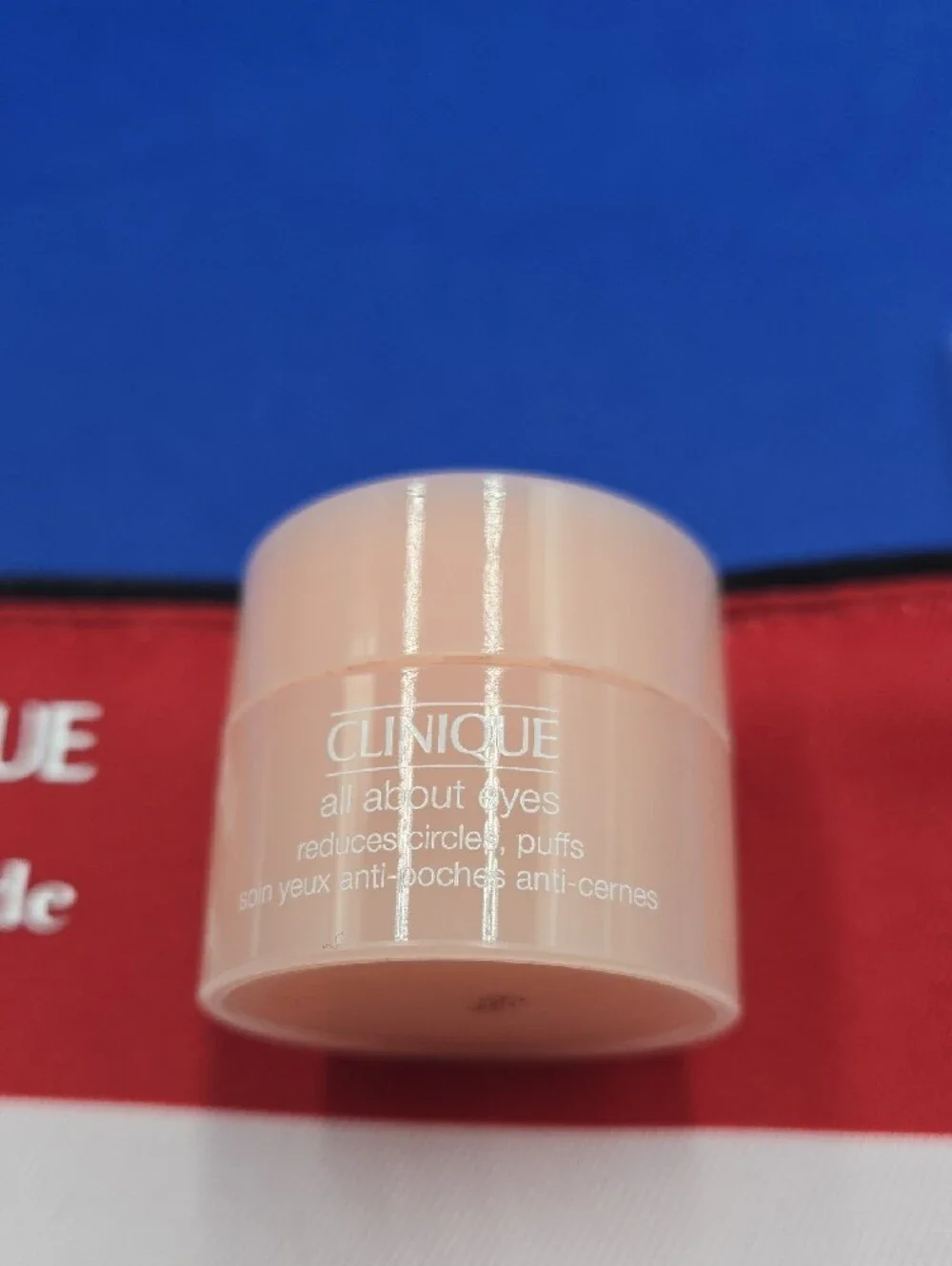 Clinique Pink and Red Striped Makeup Pouch with Mini Clinique Eye Care